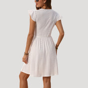 Women's white lace mini summer sundress with ruffle sleeves