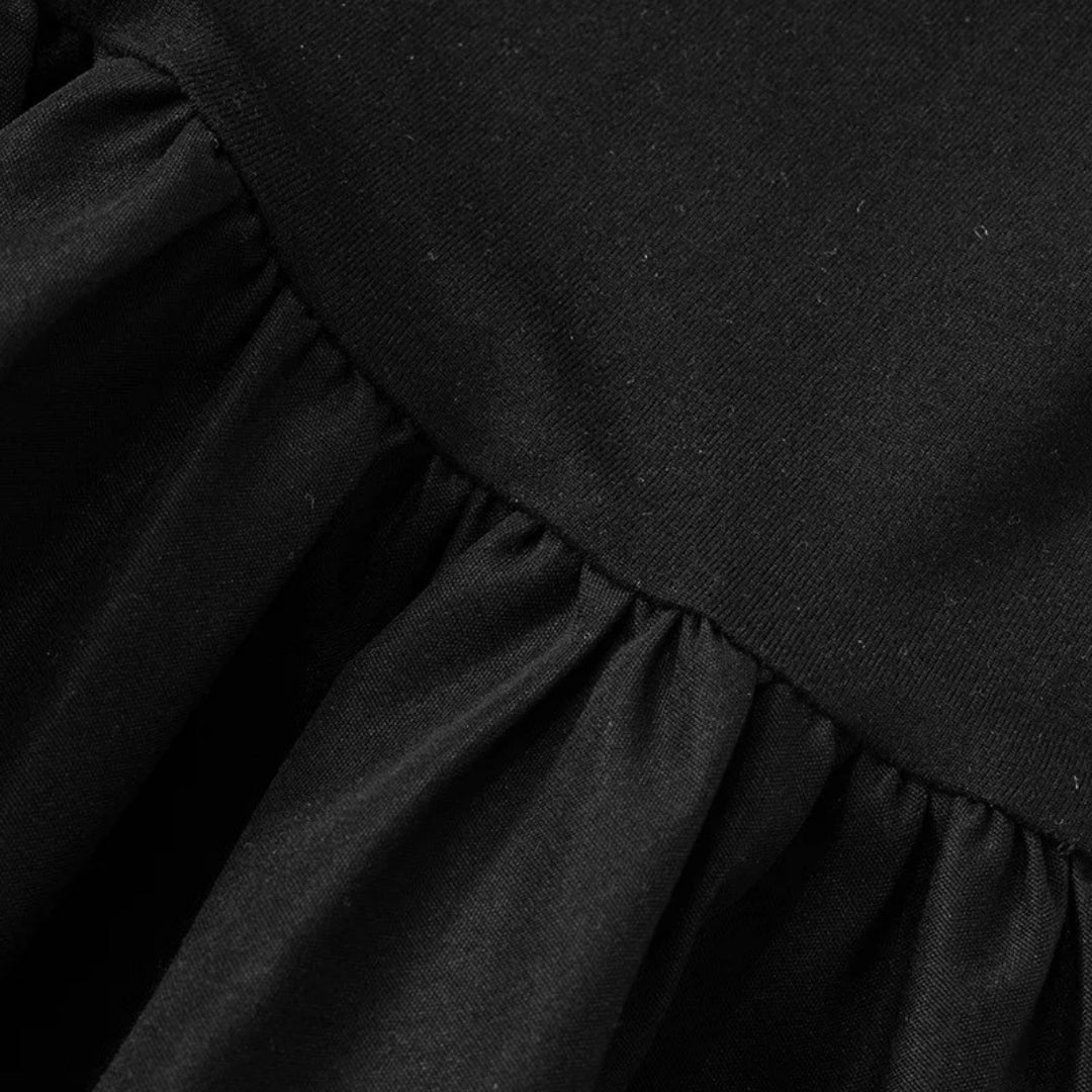 Sleeveless black drop-waist dress