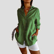 Women’s oversized long sleeve button up blouse