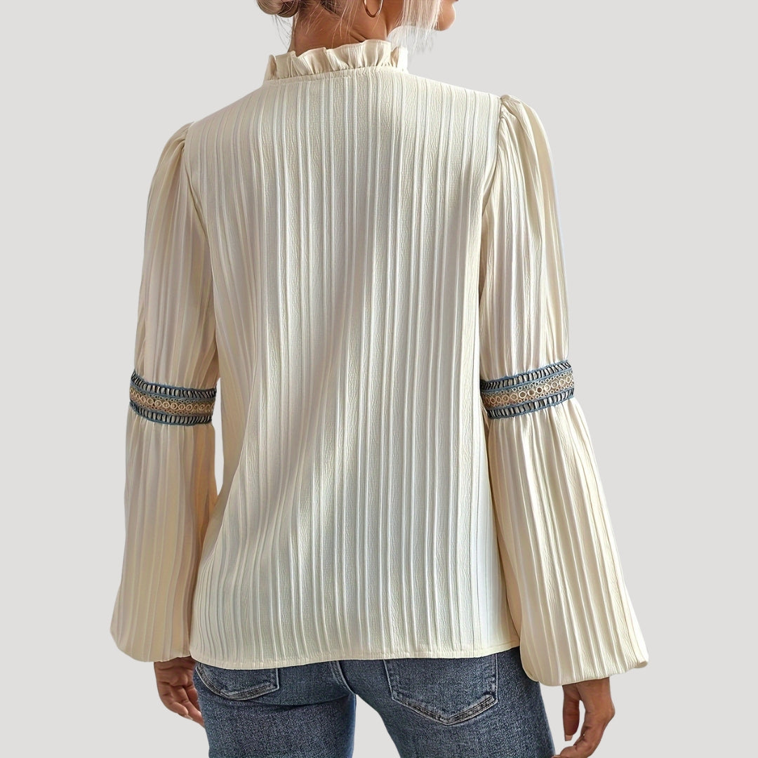 Women’s embroidered long sleeve v neck cream blouse
