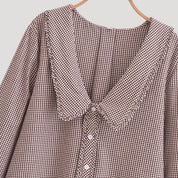 Gingham blouse with ruffled collar