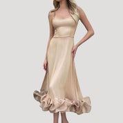 Women’s strappy ruffle hem midi wedding guest dress