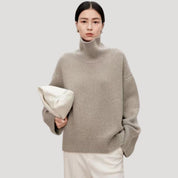 Women’s oversized cashmere high neck knitted sweater