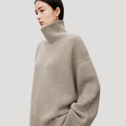 Women’s oversized cashmere high neck knitted sweater