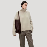 Women’s oversized cashmere high neck knitted sweater