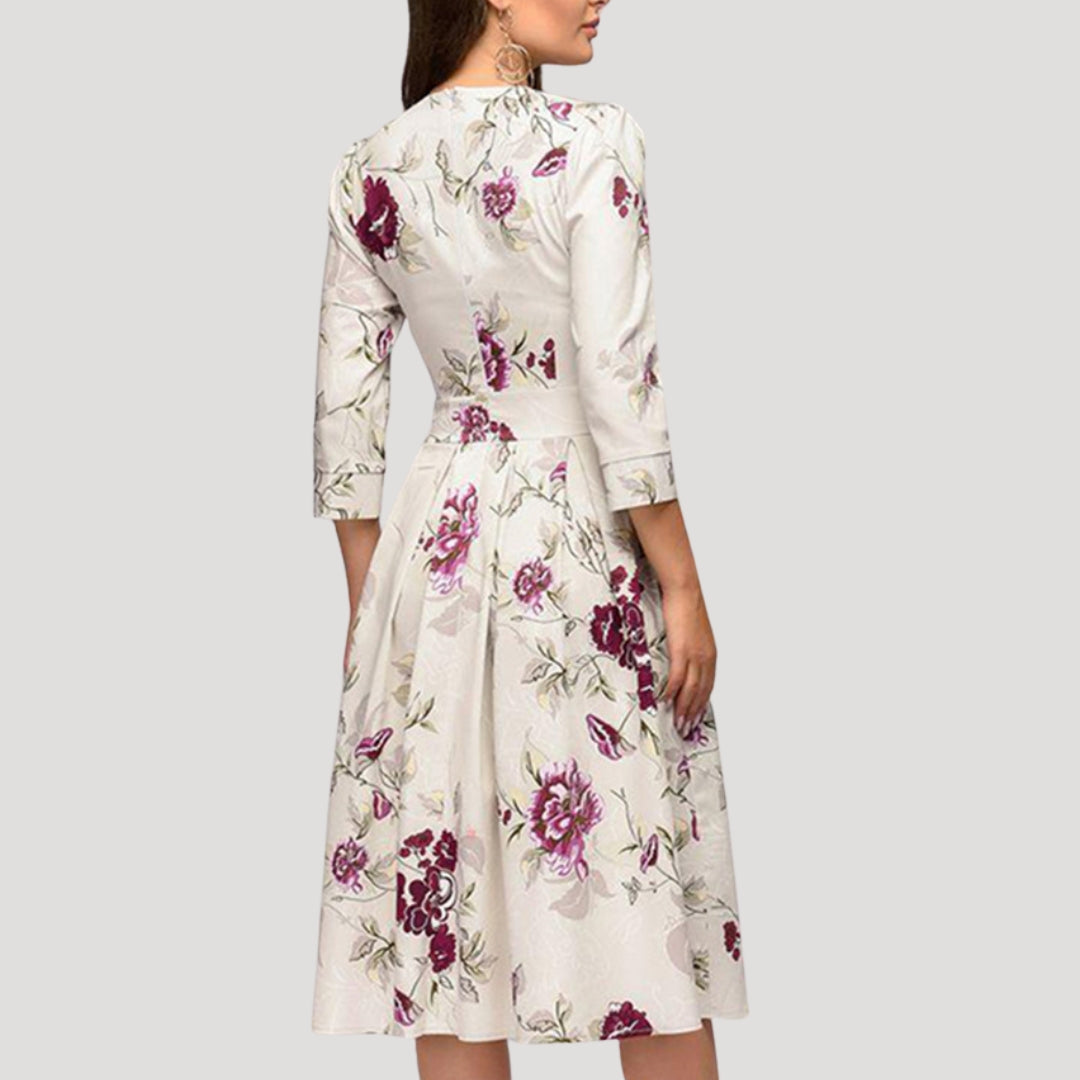 Women’s floral long sleeve midi wedding guest dress