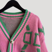 Women’s chunky knit oversized graphic button up cardigan