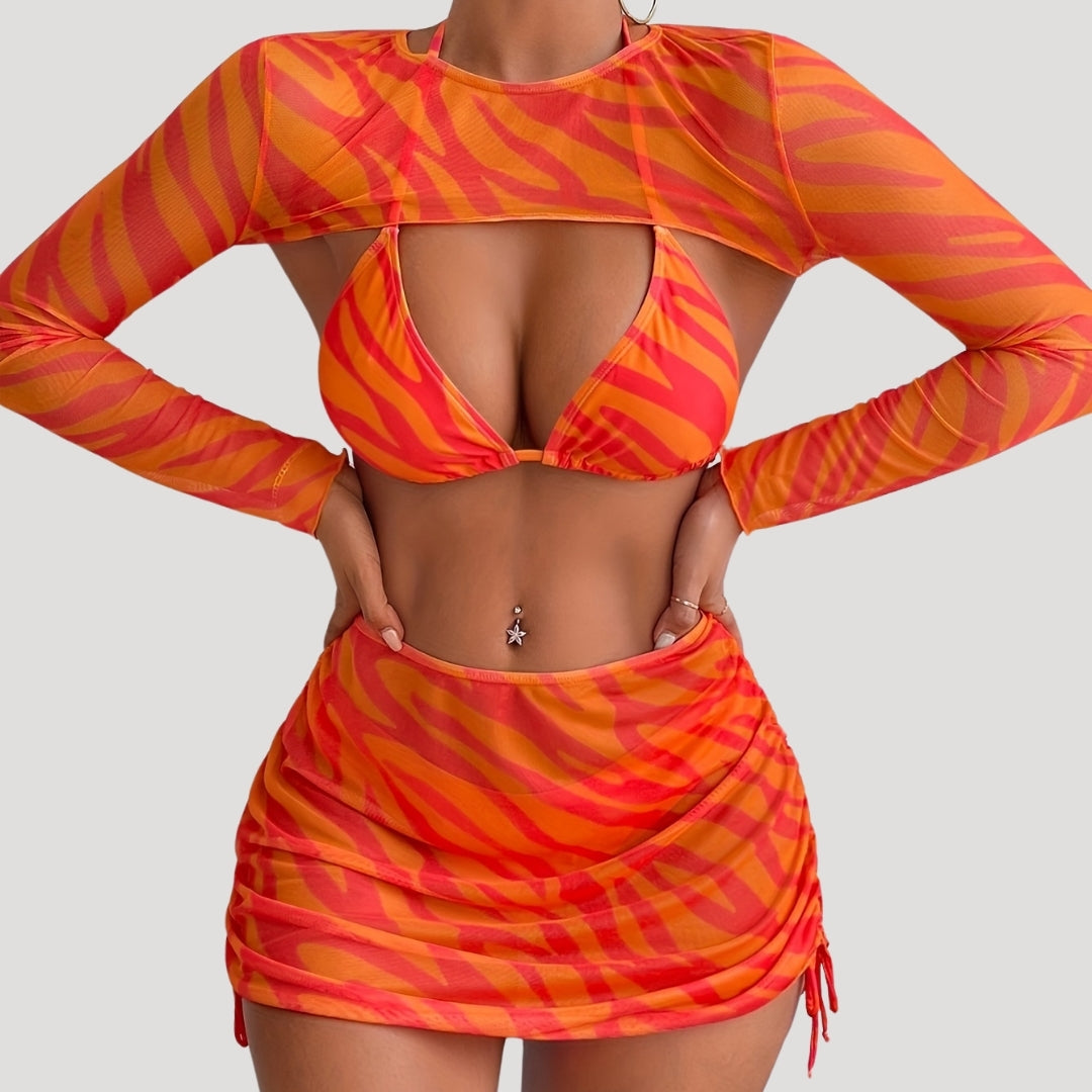 Bold three-piece bikini set with mesh cover-up