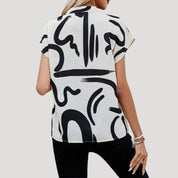 Abstract print short sleeve blouse