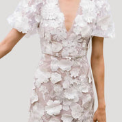 Women's floral mini wedding guest dress with puff sleeves