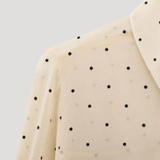 Polka dot bow-tie blouse