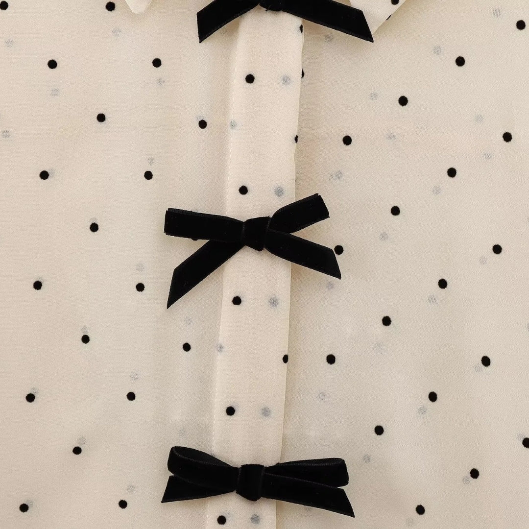 Polka dot bow-tie blouse