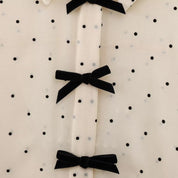 Polka dot bow-tie blouse