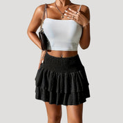 Smocked high-waist ruffle mini skirt